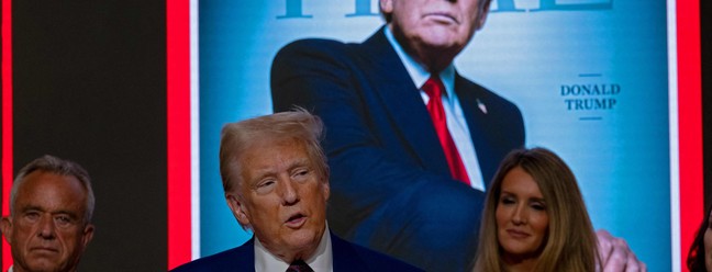 Presidente eleito dos Estados Unidos, Donald Trump, discursa na recepção da Bolsa de Valores de Nova York, após ser nomeado "Pessoa do Ano" da revista Time pela segunda vez — Foto: SPENCER PLATT / GETTY IMAGES NORTH AMERICA / Getty Images via AFP