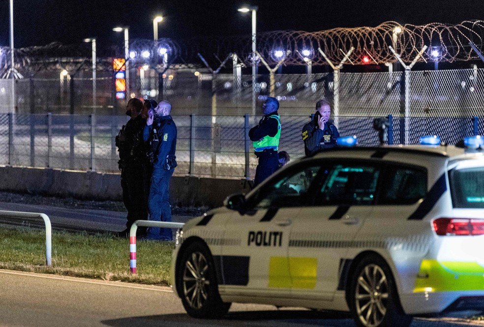 Danish police officers inspect Copenhagen Airport in Kastrup near the Danish capital – Photograph: Stephen Knapp/Ritzau Scanpix/AFP