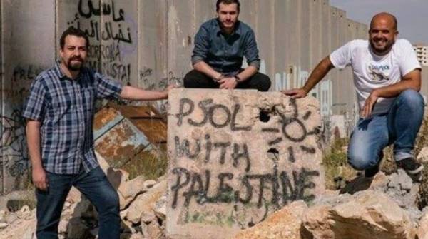 É falso que foto mostra Boulos com integrantes do Hamas