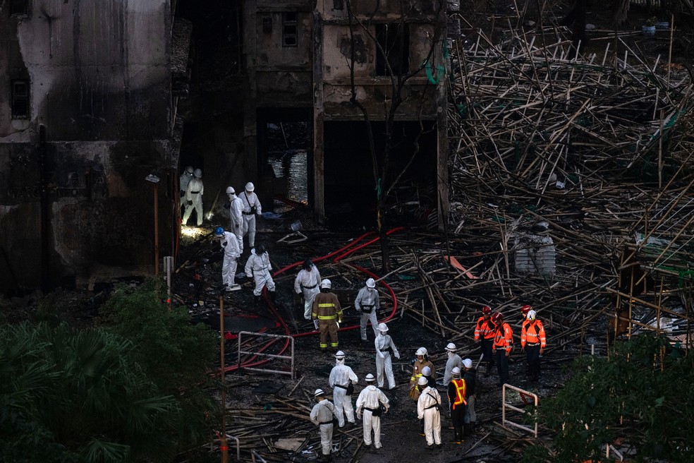 Rescue teams and authorities at the scene of the Wang Fook Court residential complex in Tai Po, Hong Kong - Photograph: Lam Yik Fai/The New York Times