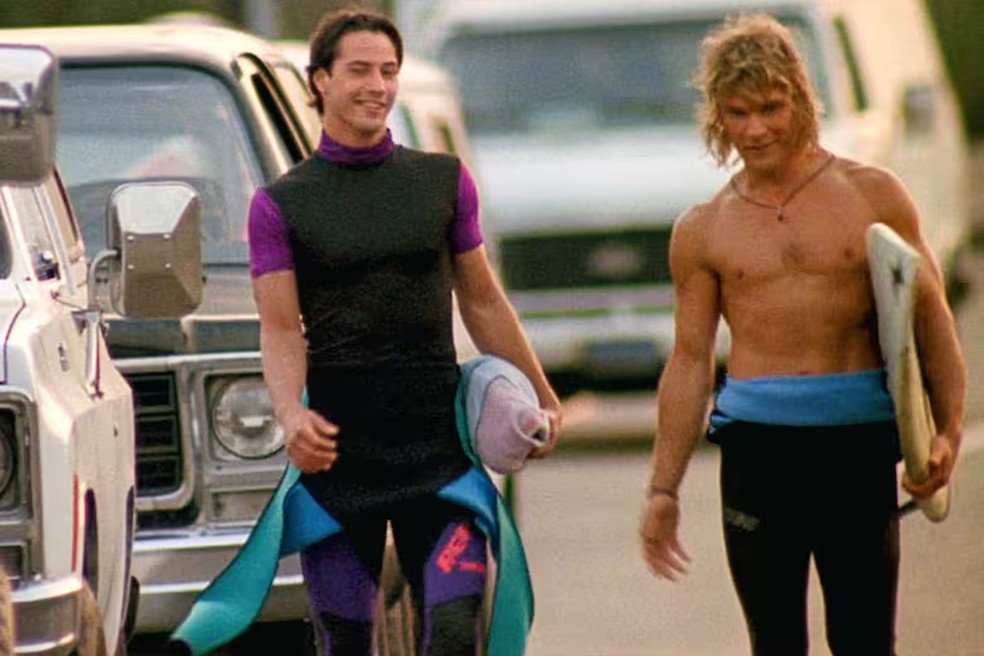Keanu Reeves e Patrick Swayze em'Caçadores de emoção' — Foto: Divulgação