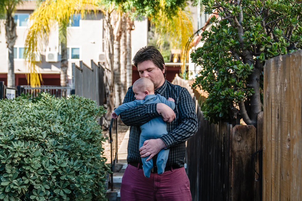 Steven Paul had to take a leave of absence from his job with the San Diego County Sheriff's Department to care for his son while his wife was detained by Immigration and Customs Enforcement. -Photo: Ariana Dressler/The New York Times