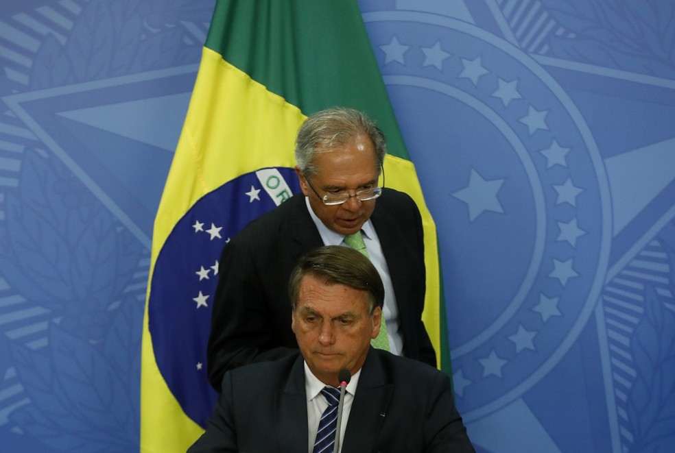 O ministro da Economia, Paulo Guedes, e o presidente Jair Bolsonaro — Foto: Cristiano Mariz/Agência O Globo
