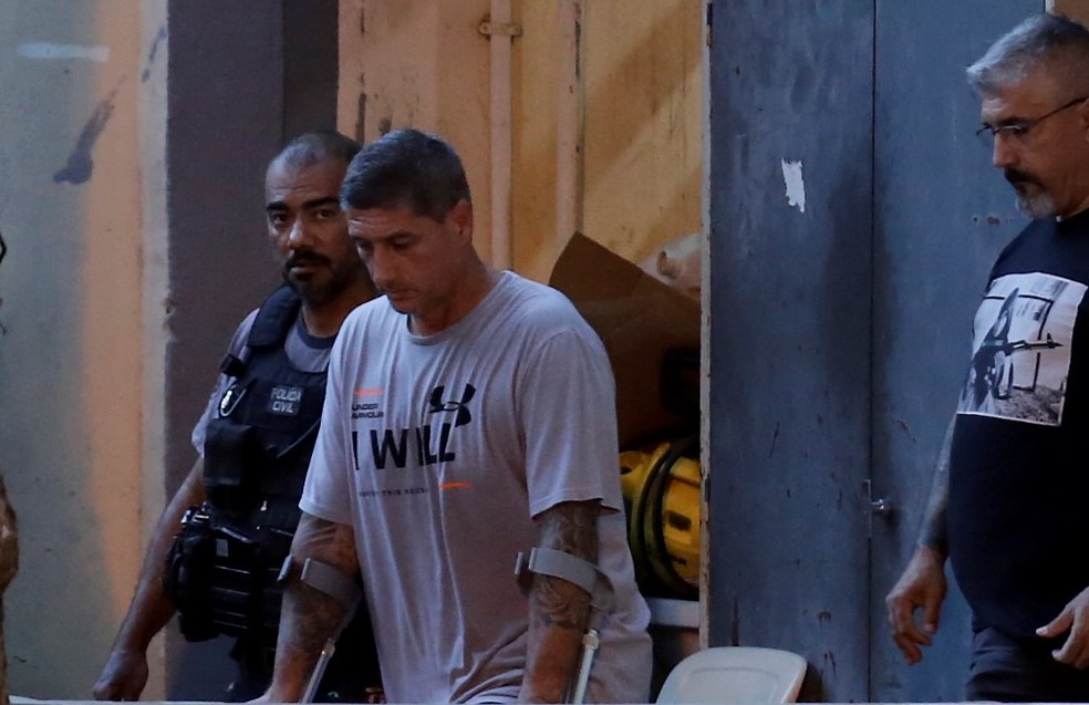 Ronnie Lessa, réu pelo assassinato de Marielle e Anderson, é deixa a Delegacia de Homicídios para Bangu em 15/03/2019 — Foto: Marcelo Theobald / Agência O Globo.