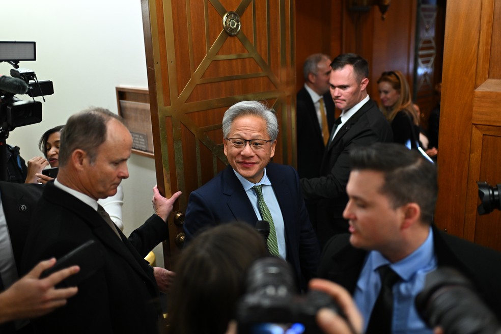 Nvidia CEO Jensen Huang speaks to the press as he arrives for a meeting with Senate committee members — Photo: Bloomberg