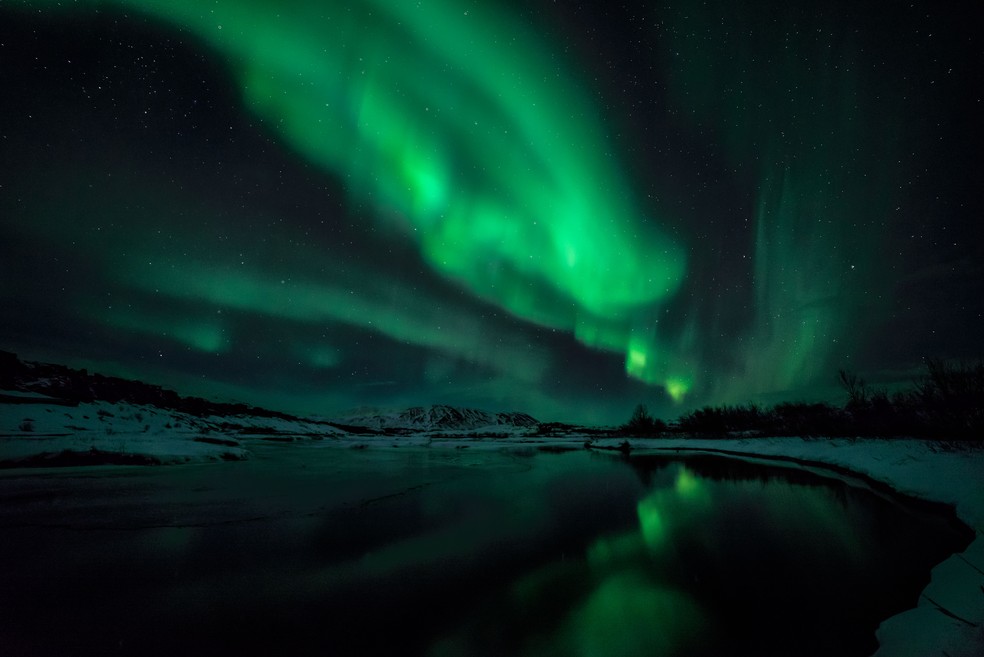Aurora boreal no Parque Nacional Thingvellir, na Islândia — Foto: Fernando Reguera/Flickr