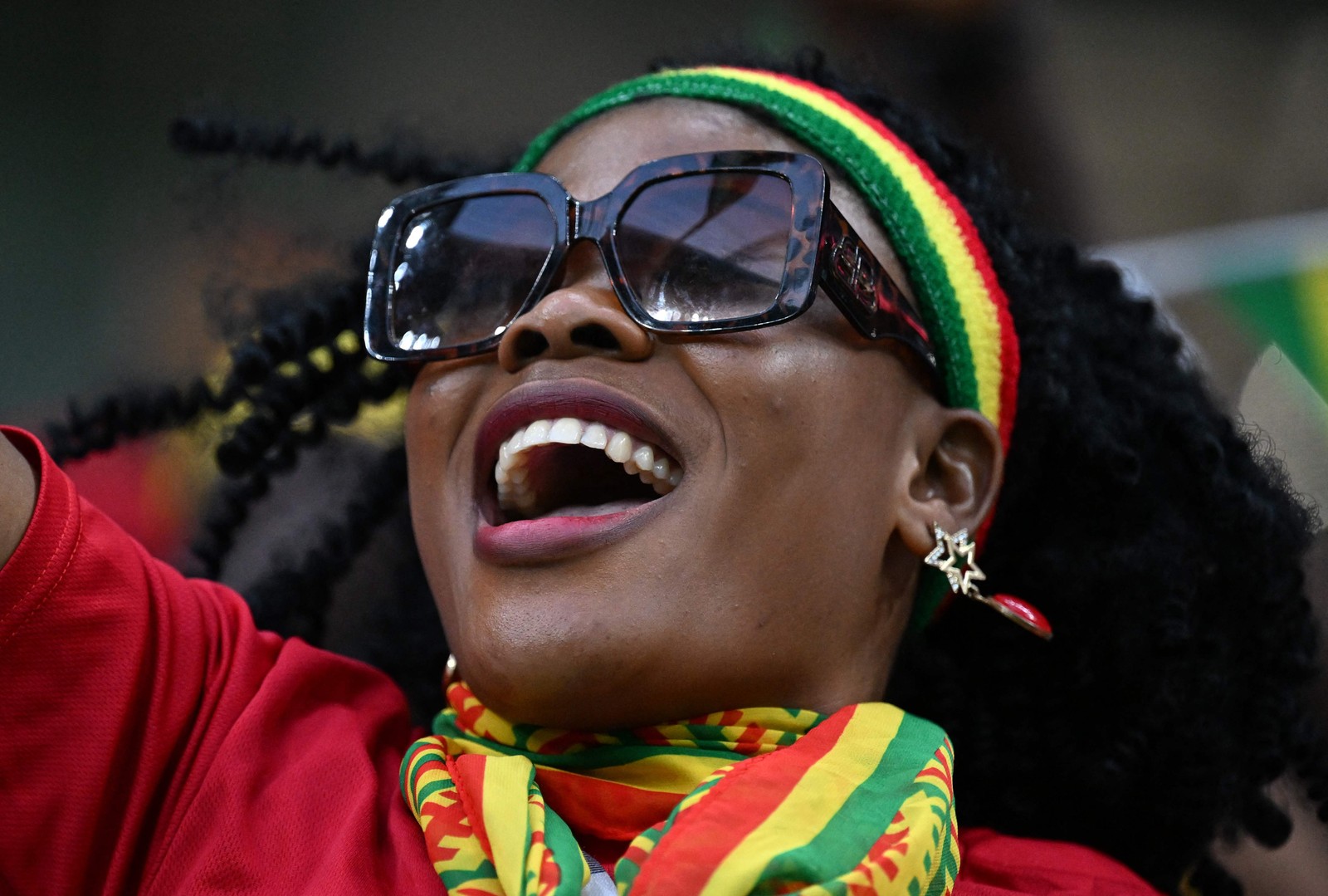 Torcedores de gana antes do jogo contra o Uruguai — Foto: RAUL ARBOLEDA/AFP