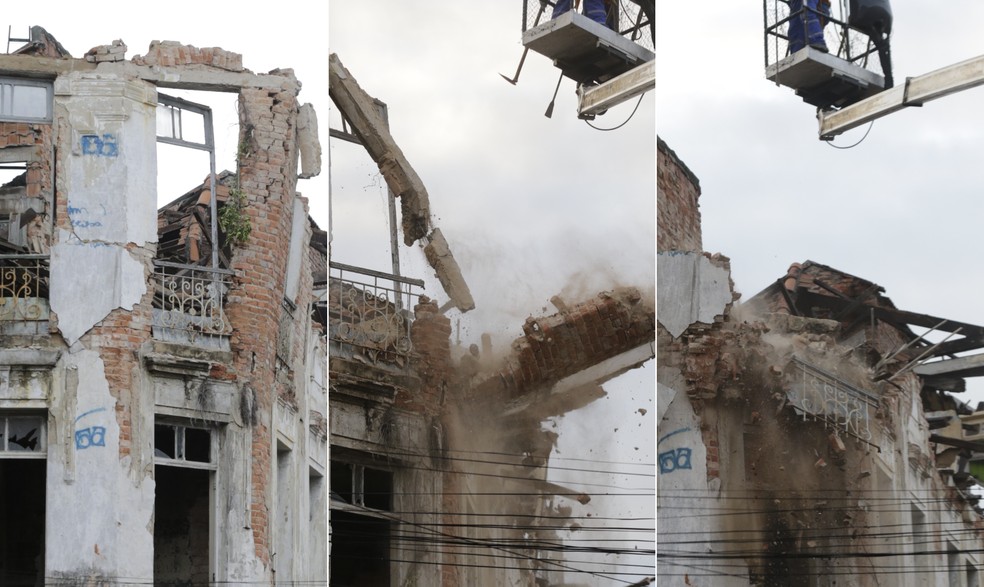 Demolição das paredes que restaram de casarão que desabou é realizada pela prefeitura no fim da tarde — Foto: Domingos Peixoto / Agência O Globo