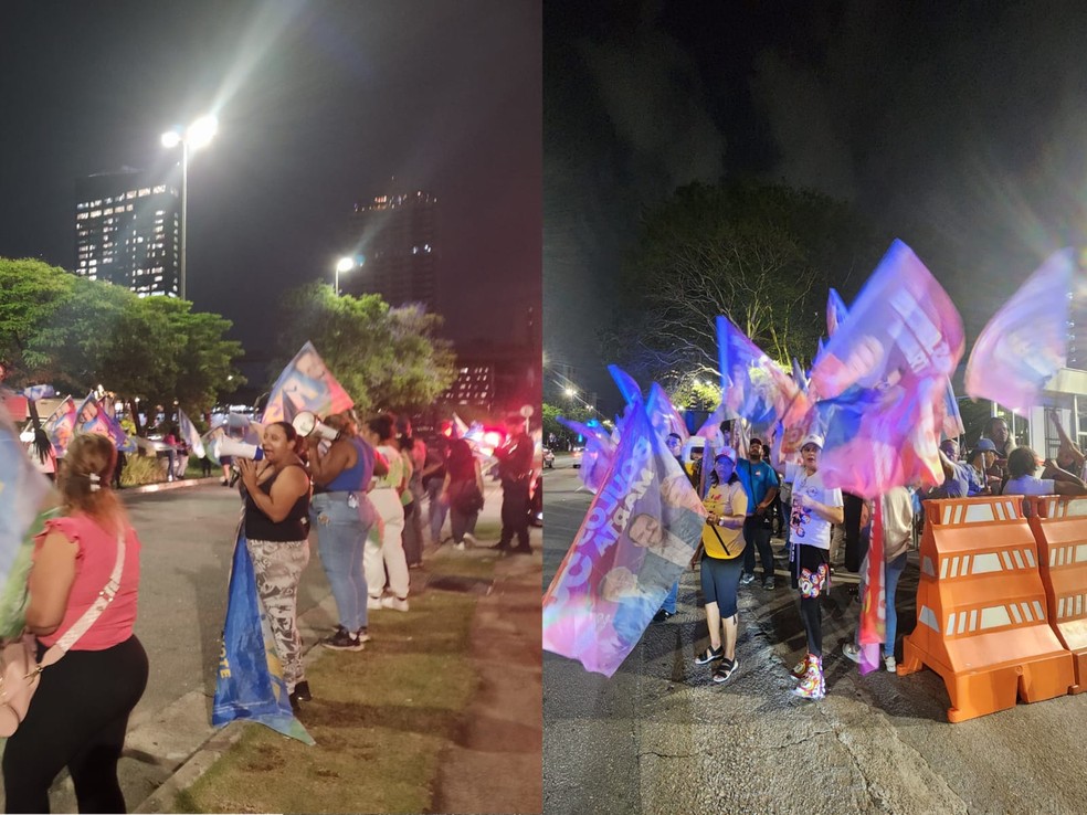 Torcidas dos candidatos na porta do estúdio da TV Globo, nesta sexta — Foto: Hyndara Freitas