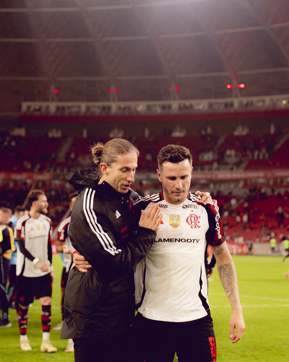 Saúl e Filipe Luís — Foto: Adriano Fontes/Flamengo
