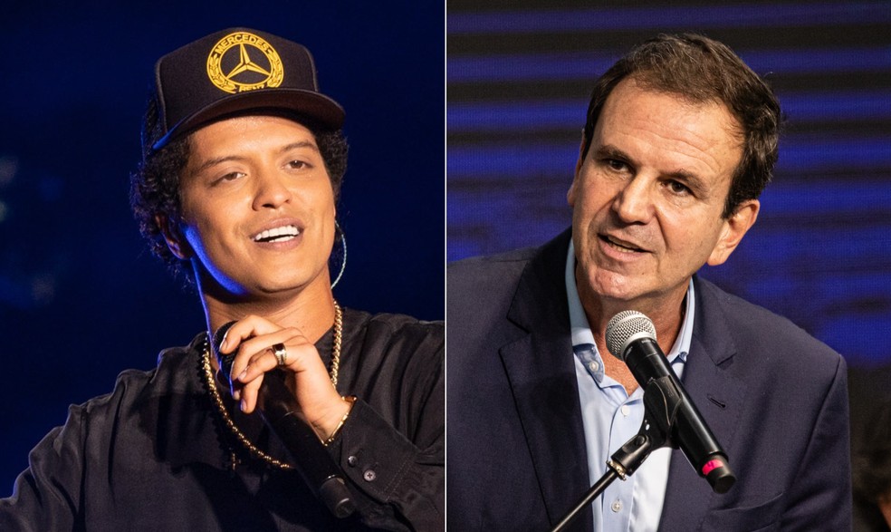 Bruno Mars e Eduardo Paes: impasse — Foto: Agência O Globo