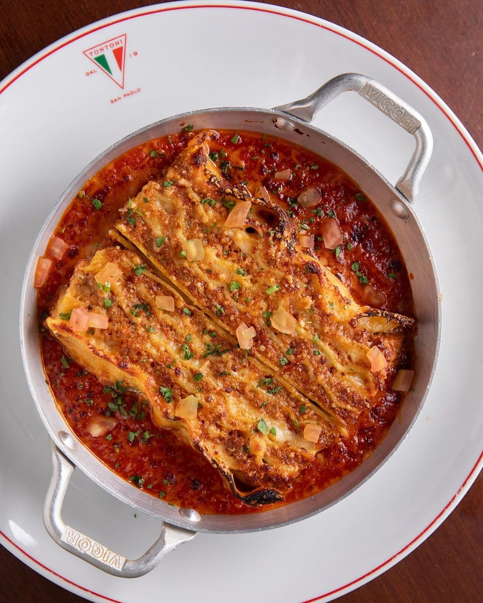 TonToni Trattoria:  Clima intimista e descolado e cozinha fiel à culinária italiana, que traz clássicos como a lasanha à bolonhesa — Foto: Reprodução