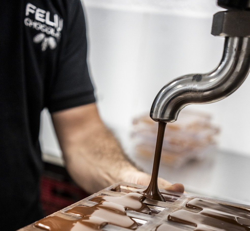 Victor Feliu, co-founder of Feliu Chocolate, operates a machine at the company in Guadalajara, Mexico. Shipping to the United States, Filho said 