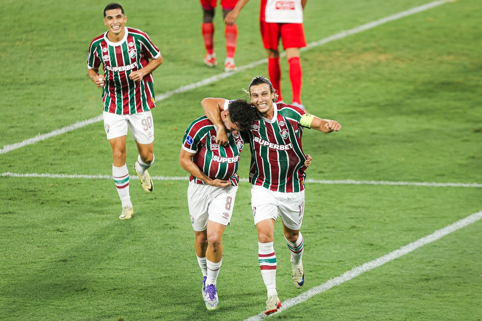 Com a esposa, Laura Bacurau, grávida, Martinelli dedicou gol ao primeiro filho na vitoria do Fluminense por 2 a 0 sobre América de Cali — Foto: MARINA GARCIA / FLUMINENSE F.C.