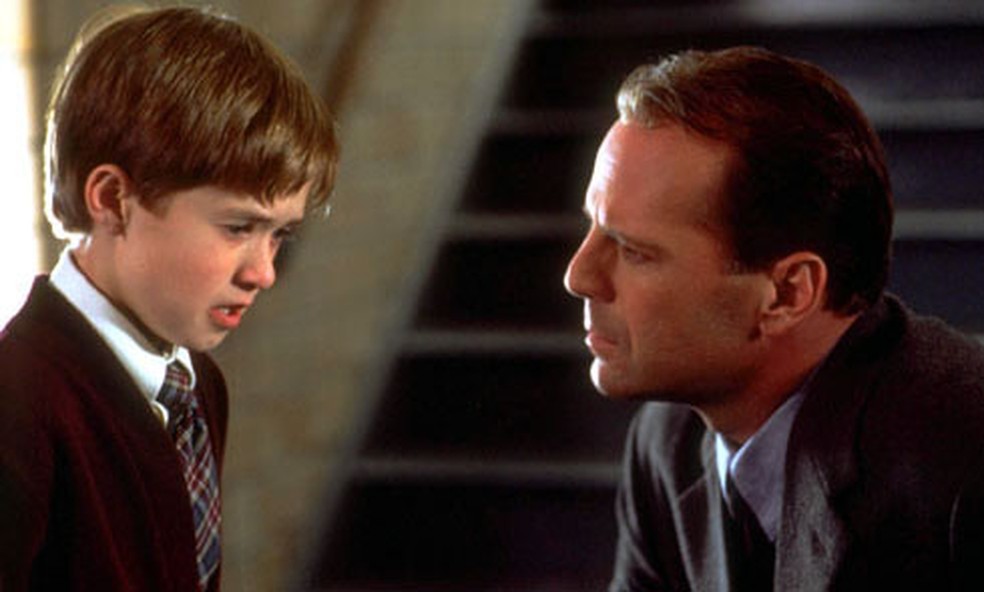 Haley Joel Osment e Bruce Willis em'O sexto sentido' — Foto: Divulgação