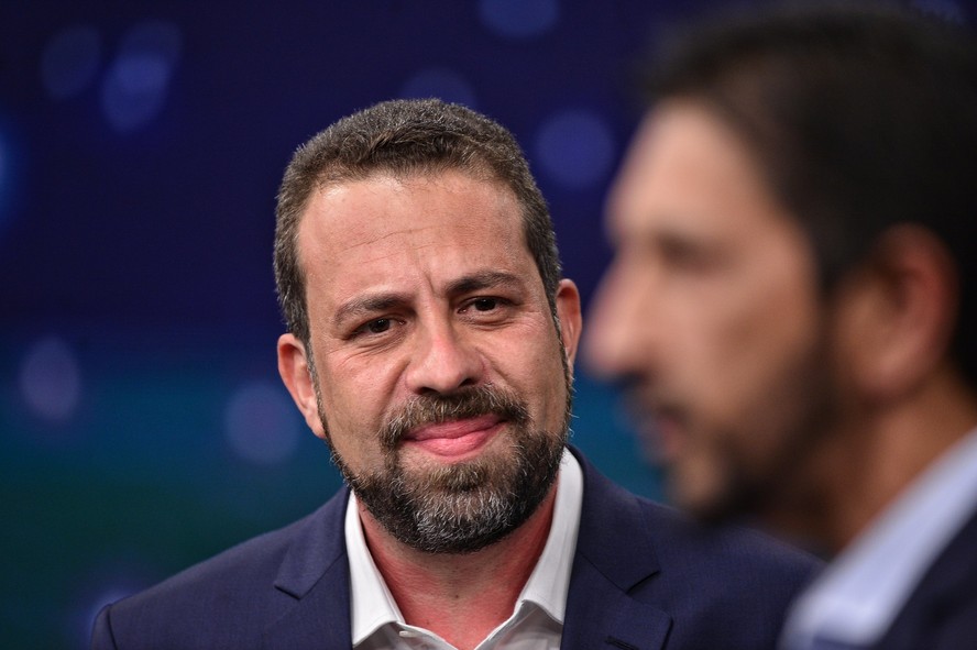 Guilherme Boulos (PSOL) e Ricardo Nunes (MDB) durante debate da Band