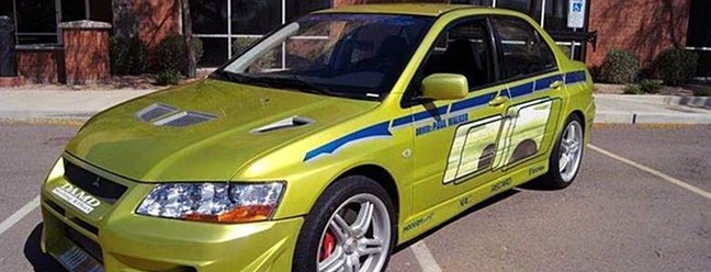 Mitsubishi Lancer Evolution 2001 — Velozes e Furiosos: Conduzido por Paul Walker, tornou-se símbolo da franquia e peça central da cultura tuning dos anos 2000. — Foto: Reprodução/Redes sociais