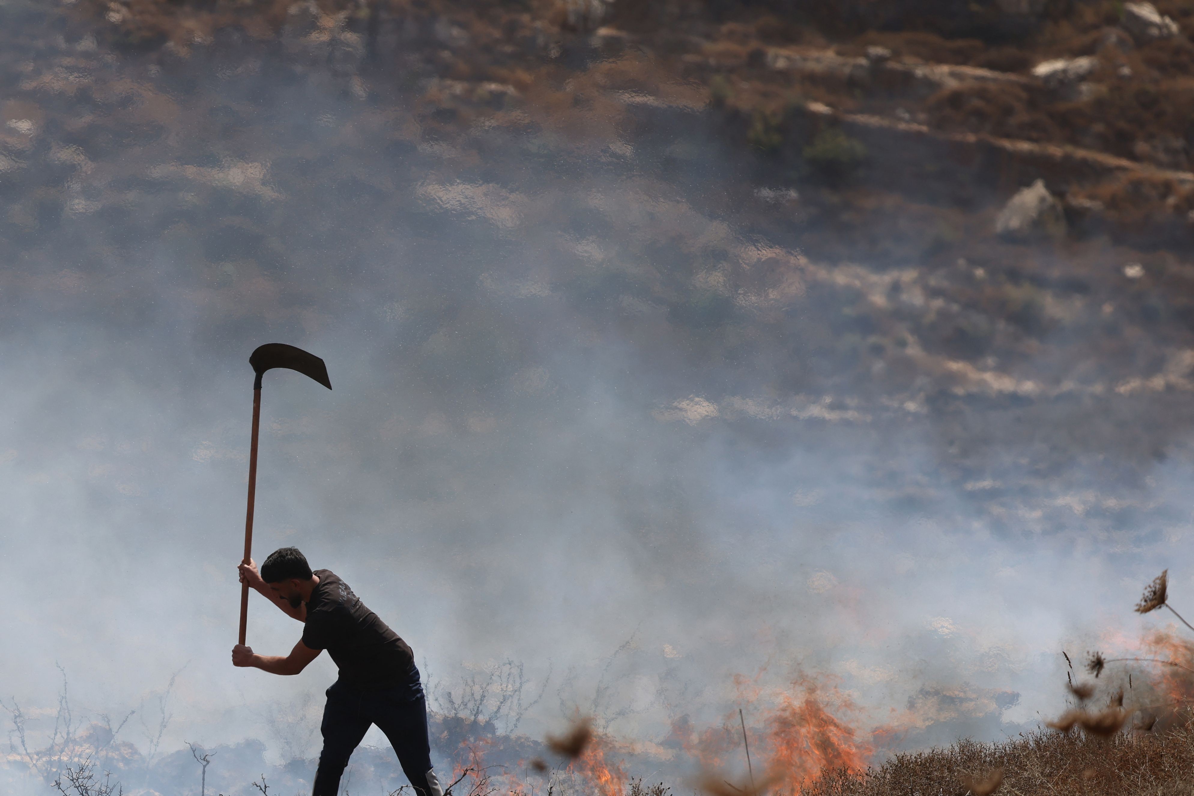 À sombra da violência de extremistas, palestinos e israelenses colaboram para se opor a tomada de terras na Cisjordânia