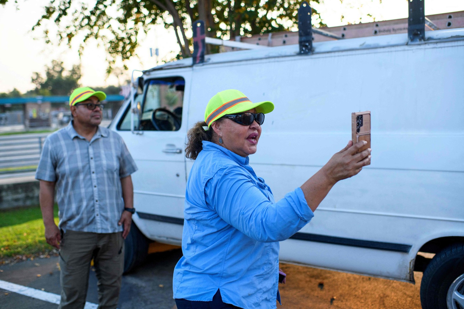 Martina, Francisco Mendoza (left) and other volunteers receive reports about possible operations and post them in real time on their Facebook page - Photograph: Mark Felix / AFP