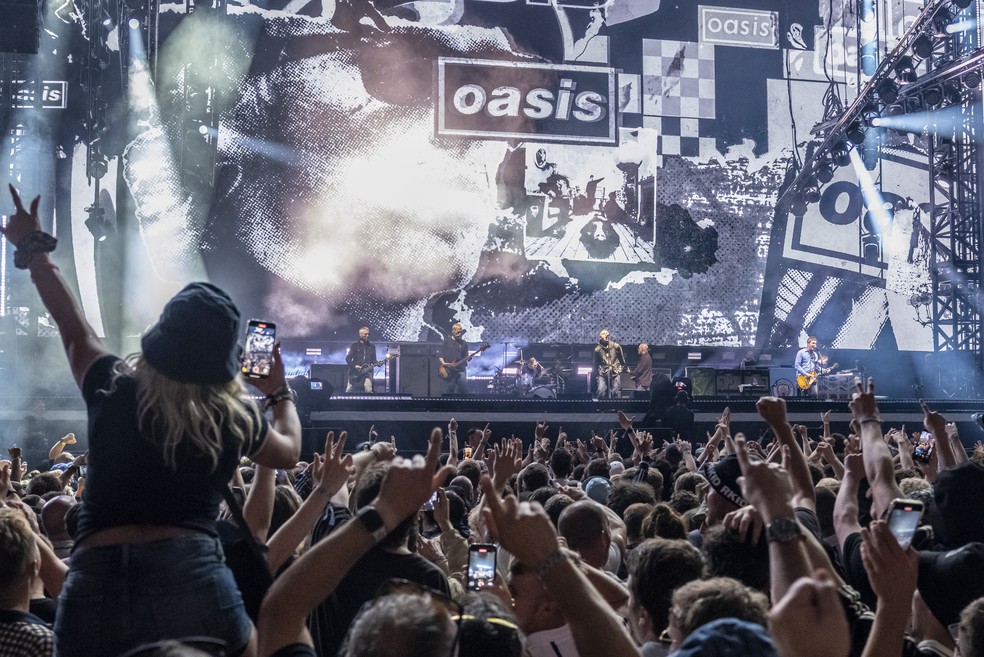 The band Oasis performs in Cardiff, Wales, on July 4, 2025 - Photo: The New York Times