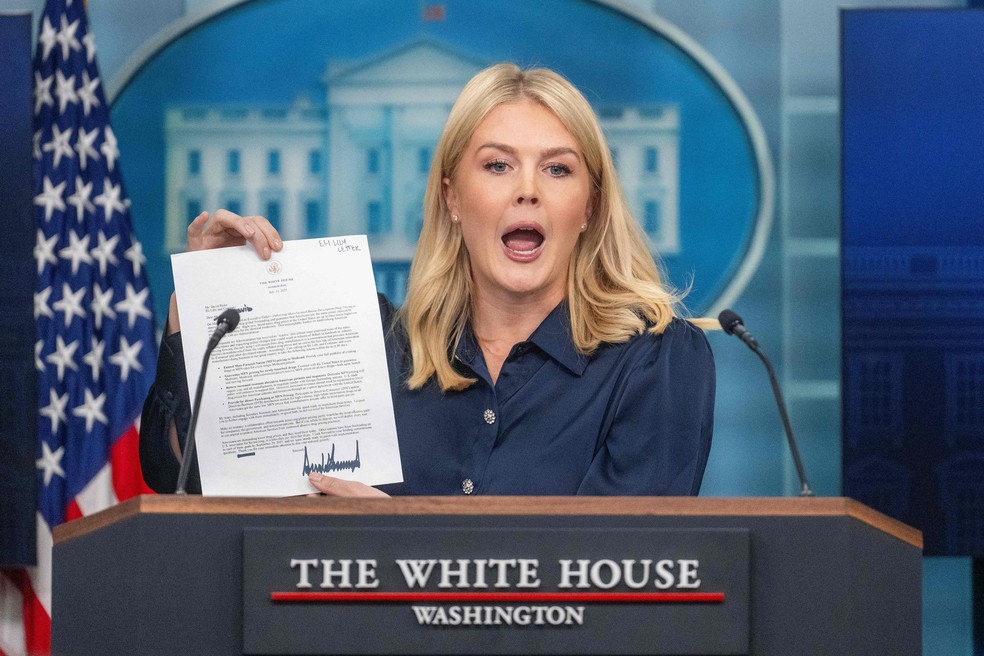 White House spokeswoman Carolyn Levitt displays a letter addressed to US pharmaceutical company Eli Lilly by President Trump during the daily press briefing - Photograph: Jim Watson/AFP