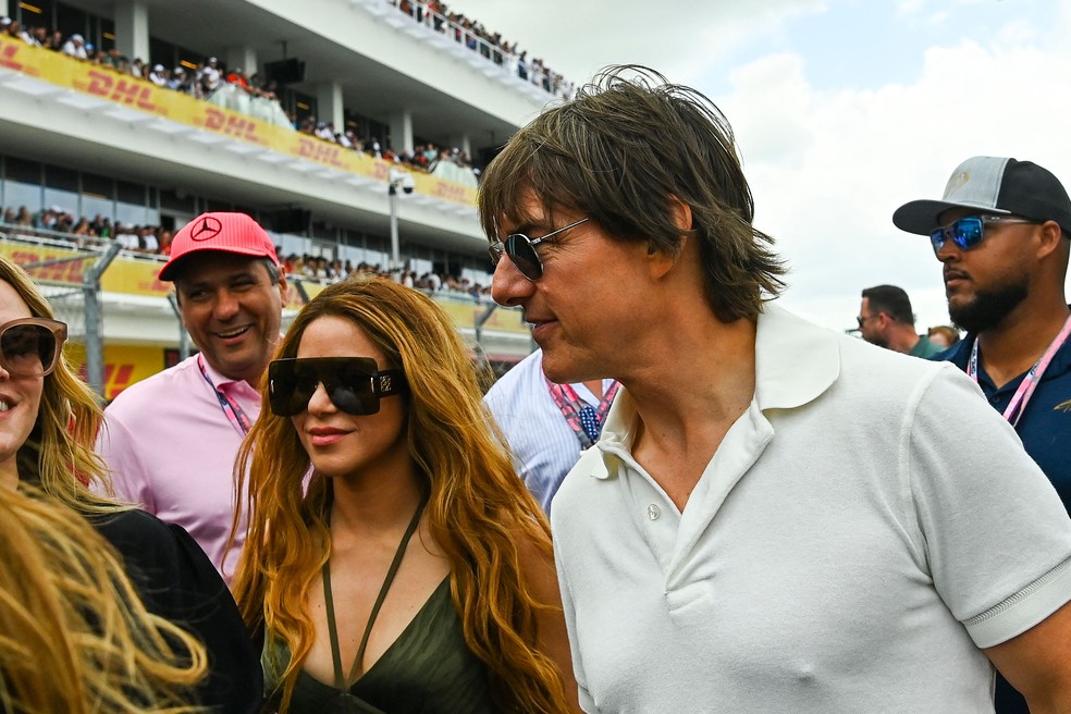 Shakira e Tom Cruise aparecem juntos em evento de Fórmula 1 nos EUA — Foto: Chandan Khanna/AFP
