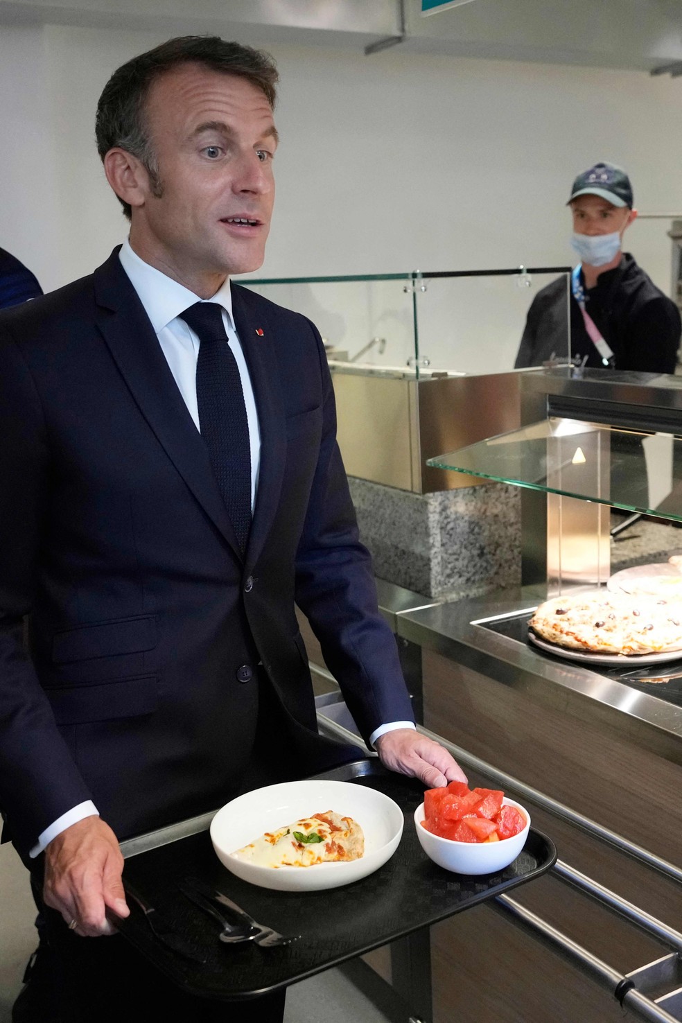 Macron a déjeuné au Village des athlètes — Photo : Michel Euler / POOL / AFP