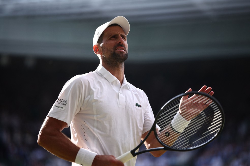Esse foi o quarto confronto entre Sinner e Djokovic em Wimbledon: Djoko venceu dois e Sinner também venceu dois — Foto: Henry NICHOLLS/AFP
