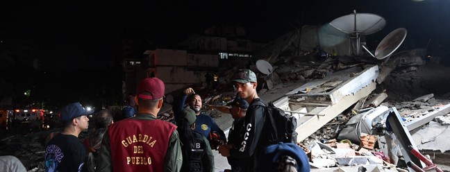 Prédios destruídos, feridos e pânico: imagens mostram destruição causada por terremoto na Venezuela — Foto: Juan Barreto/AFP