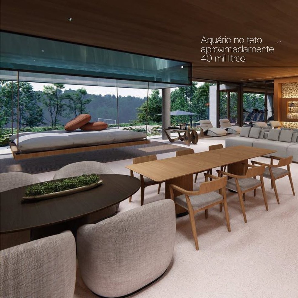 Sala de estar de nova mansão de Arthur Aguiar tem aquário para tubarão no teto — Foto: Reprodução/Instagram