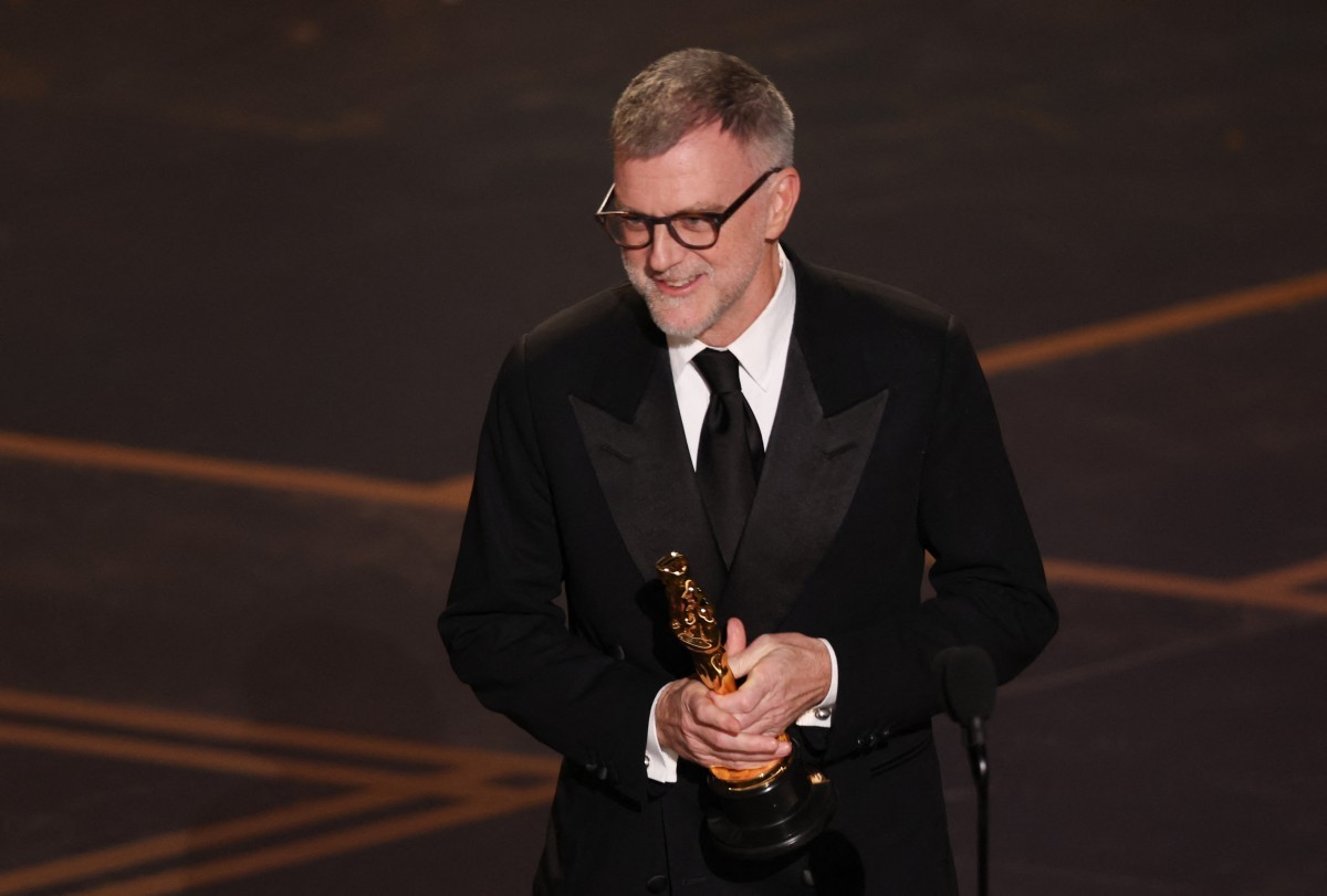 Paul Thomas Anderson conquista o Oscar de melhor diretor. — Foto: PATRICK T. FALLON / AFP