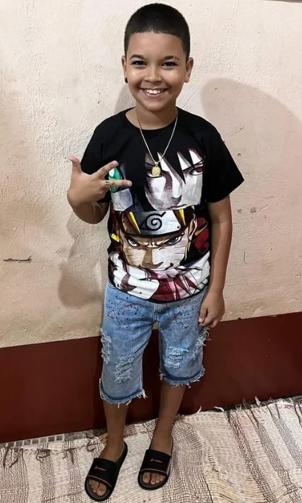 Juan Davi de Souza Faria, de 11 anos, foi baleado na noite do Réveillon, em Nilópolis — Foto: Reprodução