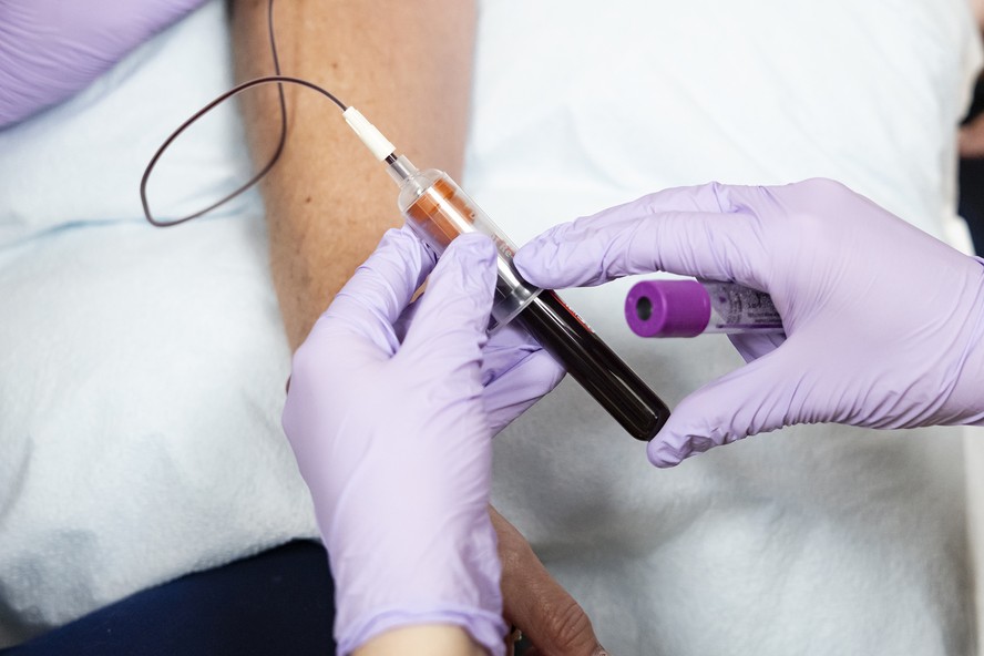 Sangue sendo coletado